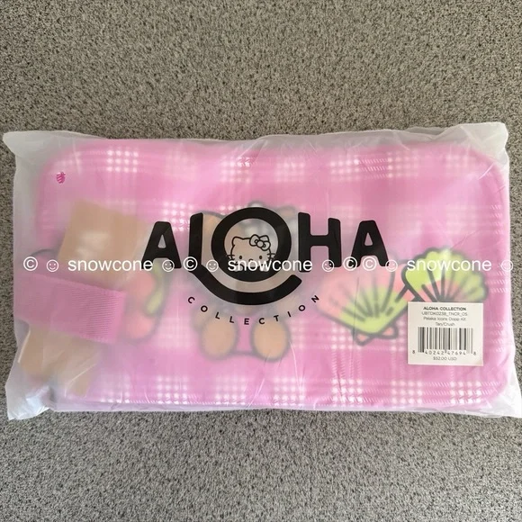 Aloha Collection x Sun kissed Hello Kitty Hawaii Exclusive Pink Palaka Dopp Kit - Picture 5 of 10